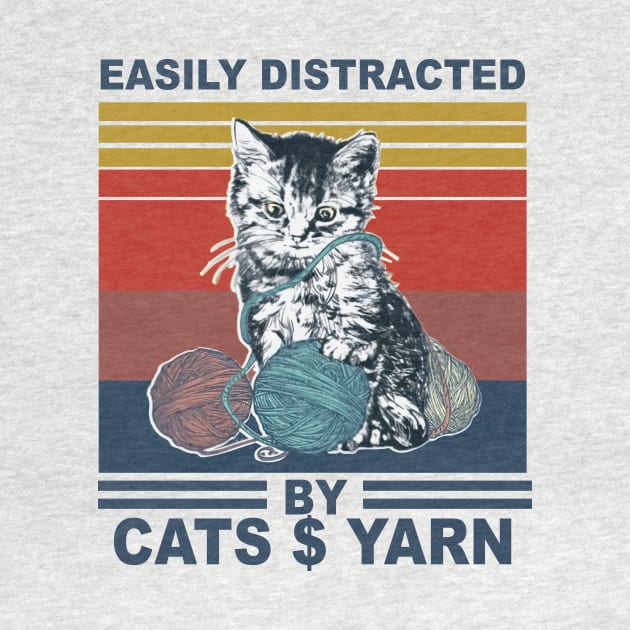 cat easily distracted by cats and yarn by Phylis Lynn Spencer